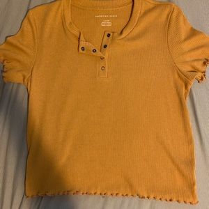 yellow orange american eagle button up shirt